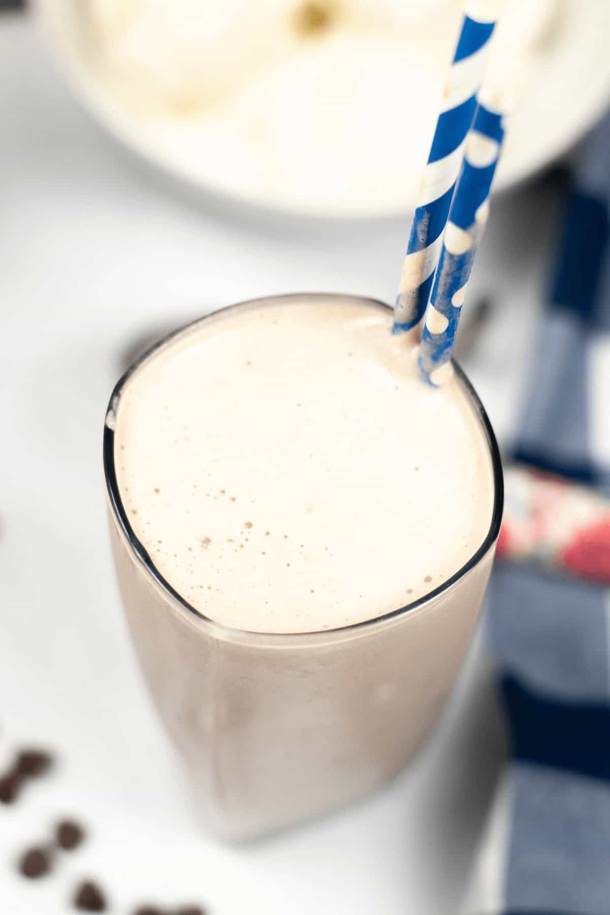 a top shot photo of the drink with straws.