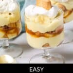 Three glass dishes showcase easy banana pudding, featuring layers of vanilla wafers and creamy banana filling, all topped with a dollop of whipped cream and an extra wafer for that perfect touch.