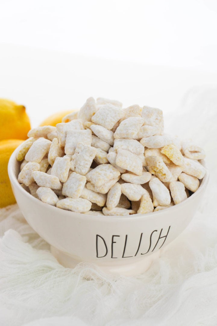 Lemon Muddy Buddies in a rae dunn delish dish.