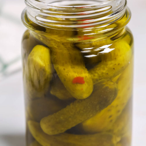 Moonshine Pickles in a mason jar.
