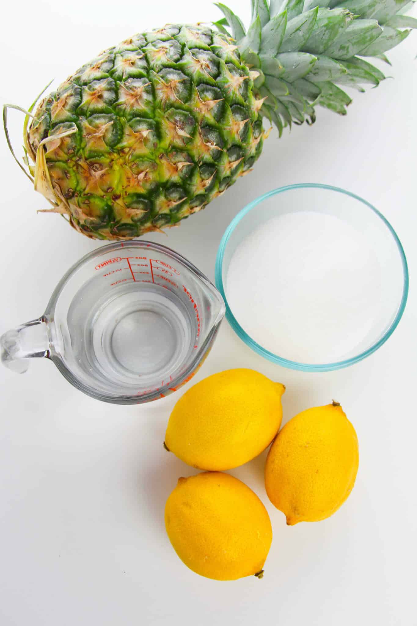 Lemons, pineapples, sugar and water.