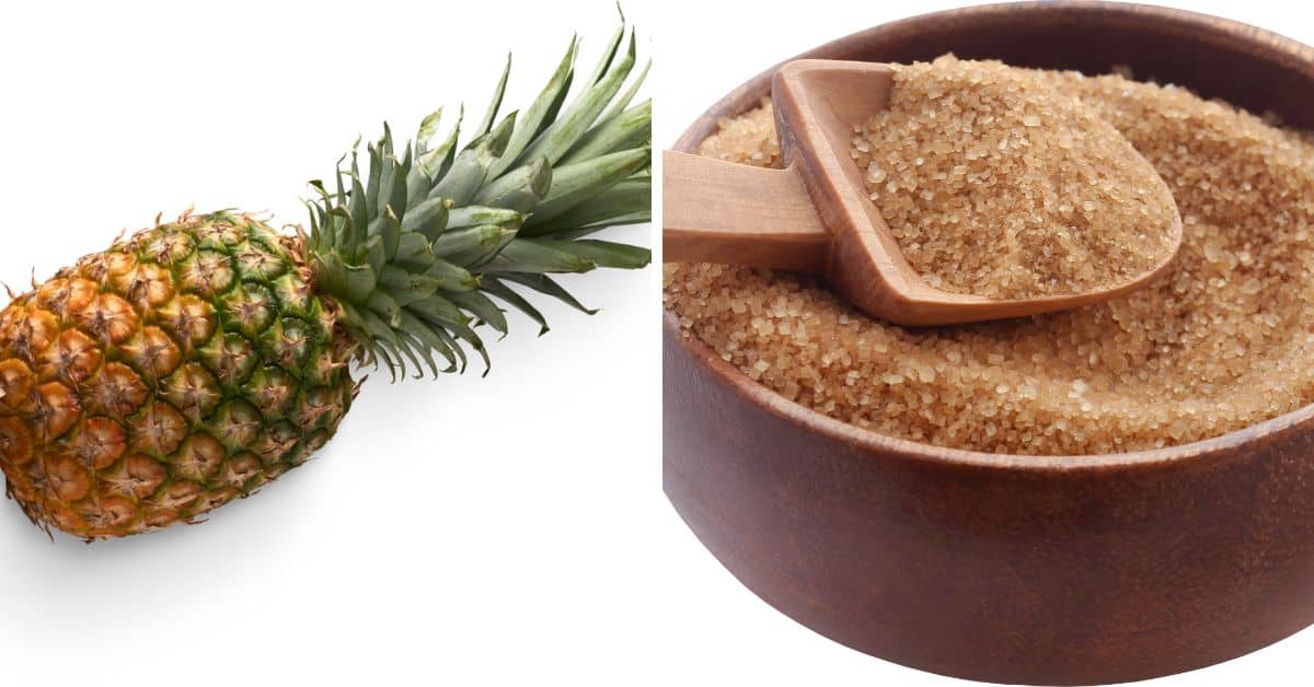 A ripe pineapple with green leaves on the left and a wooden bowl filled with brown sugar, perfect for making Brown Sugar Glazed Pineapple, with a wooden scoop on the right.