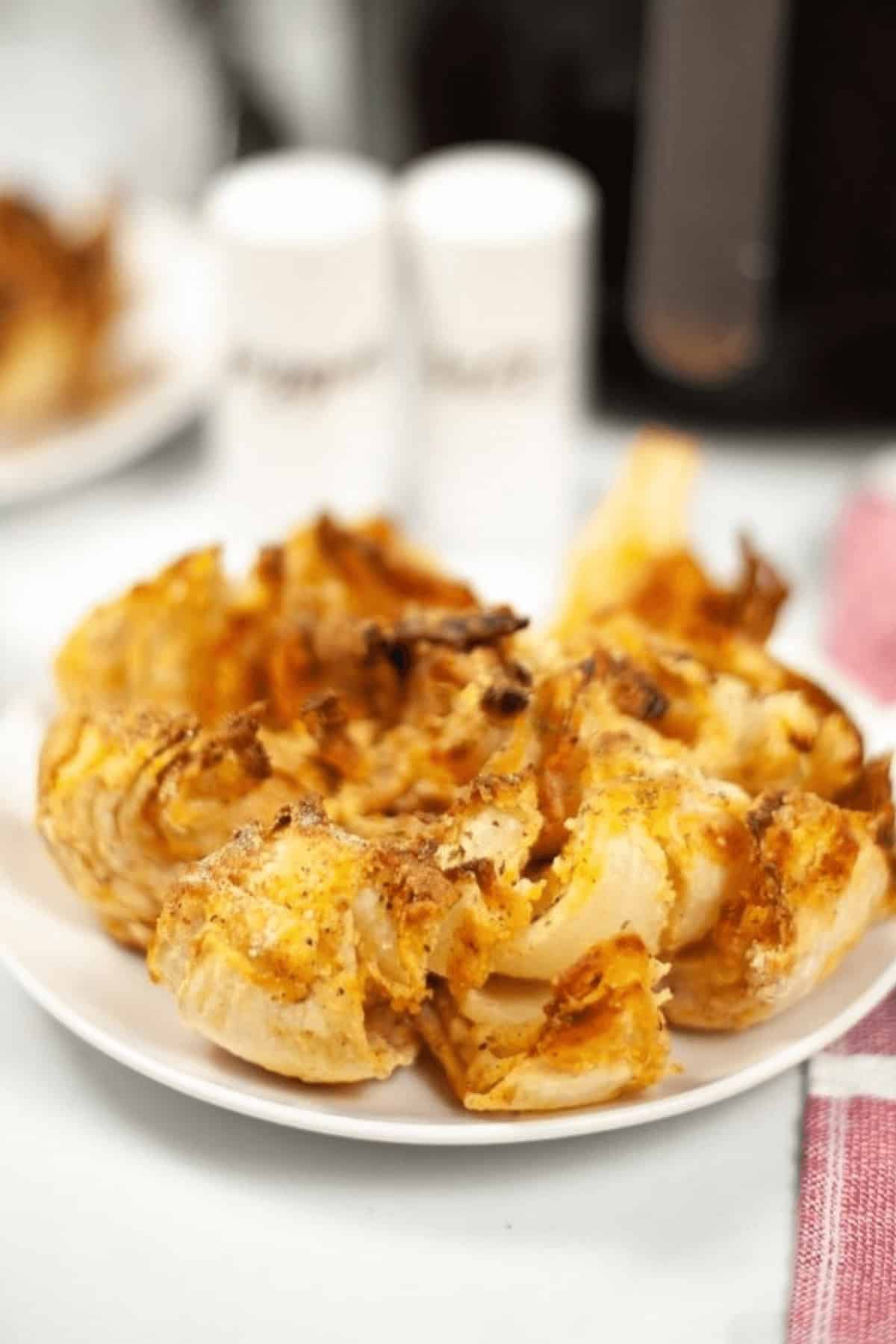 A plate of crispy, golden-brown appetizer made effortlessly in the air fryer.