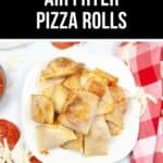 A plate of crispy air fryer pizza rolls sits on a white dish, surrounded by pepperoni slices and a sprinkle of shredded cheese atop a checkered cloth.