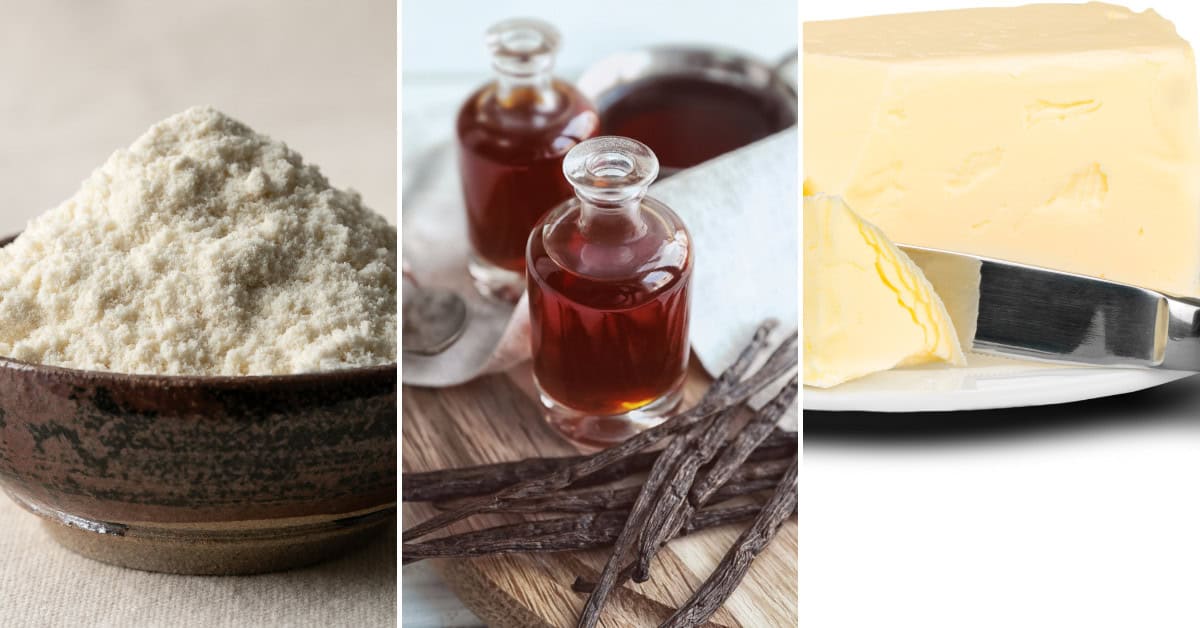 A bowl of flour, small bottles of vanilla extract with vanilla pods, and a block of butter with a knife are displayed side by side, all ready to come together in a delicious Vanilla Sheet Cake.