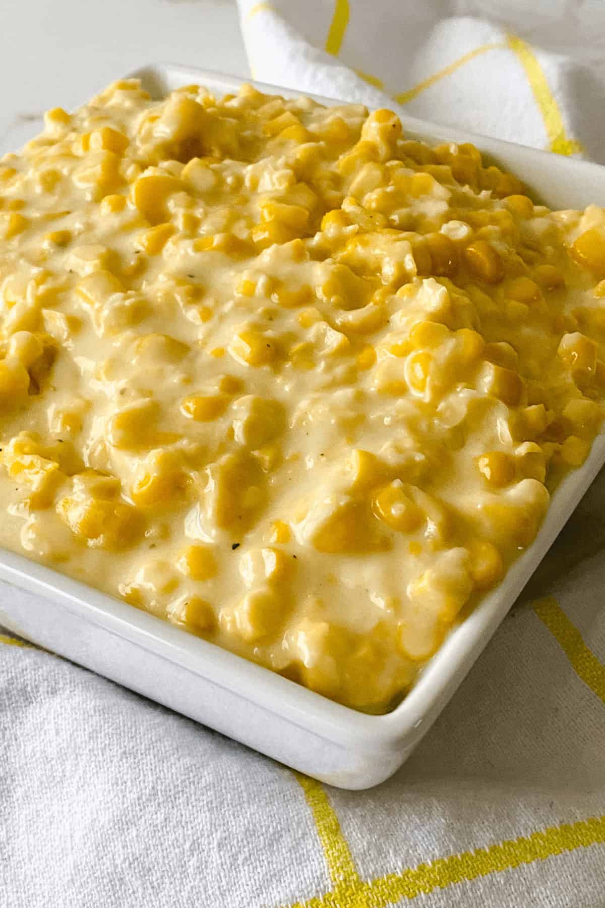 Cream Style Corn in a square baking pan.