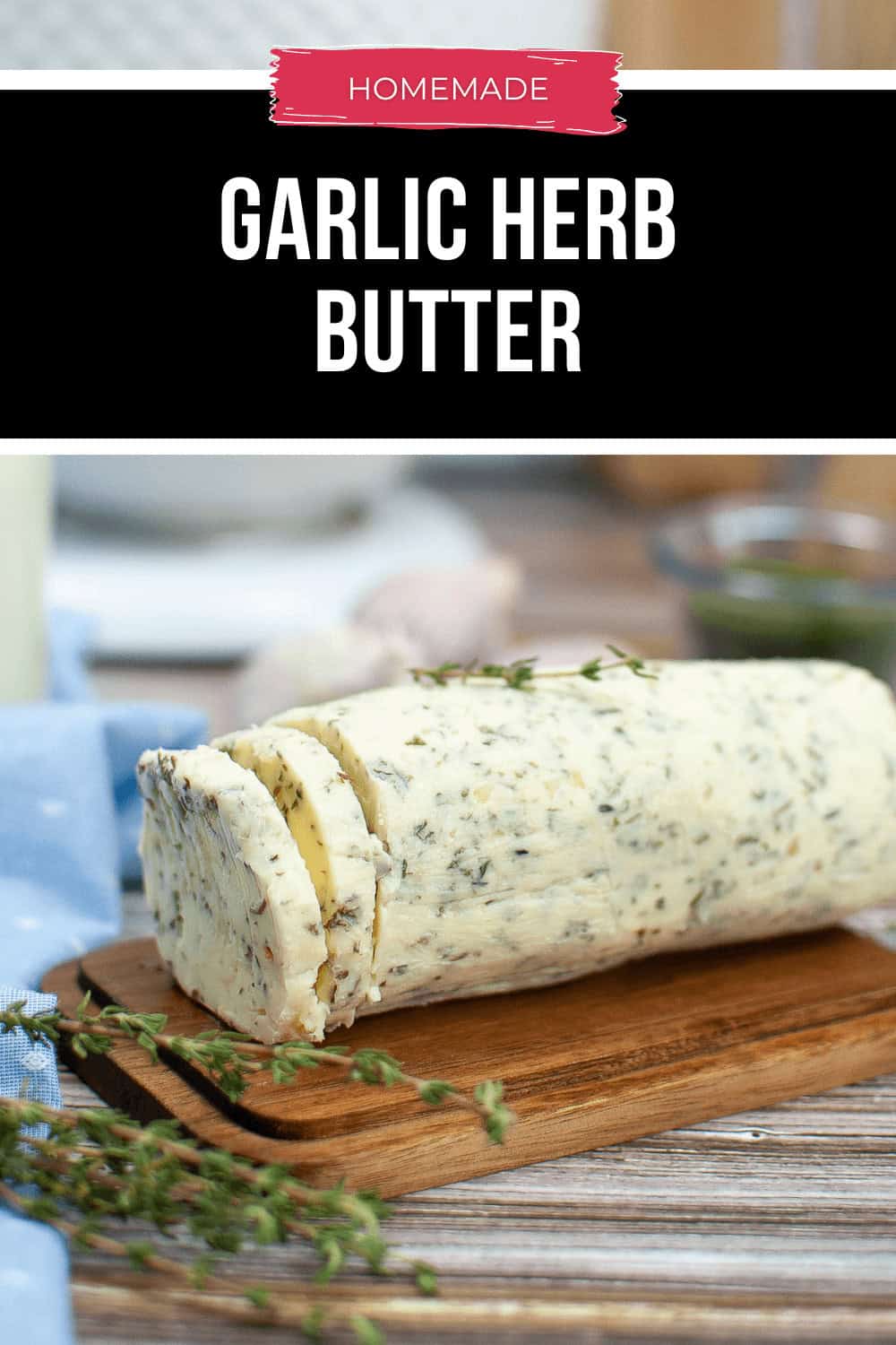 A log of Garlic Herb Butter rests on a wooden board, garnished with fresh herbs. Text above reads "Homemade Garlic Herb Butter.