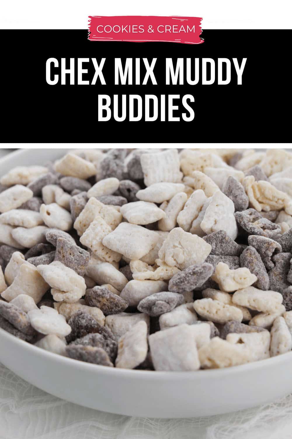 A bowl filled with decadent Cookies and Cream Chex Mix Muddy Buddies.