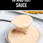 A spoonful of creamy sauce is lifted from a small clear cup. The text above reads "Copycat In n Out Sauce Recipe.