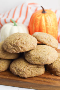 Pumpkin Spice Sugar Cookies with pumpkins in the background.