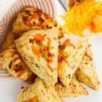 A stack of the savory cheddar bacon scones.