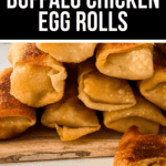 Buffalo chicken egg rolls on a rustic cutting board.