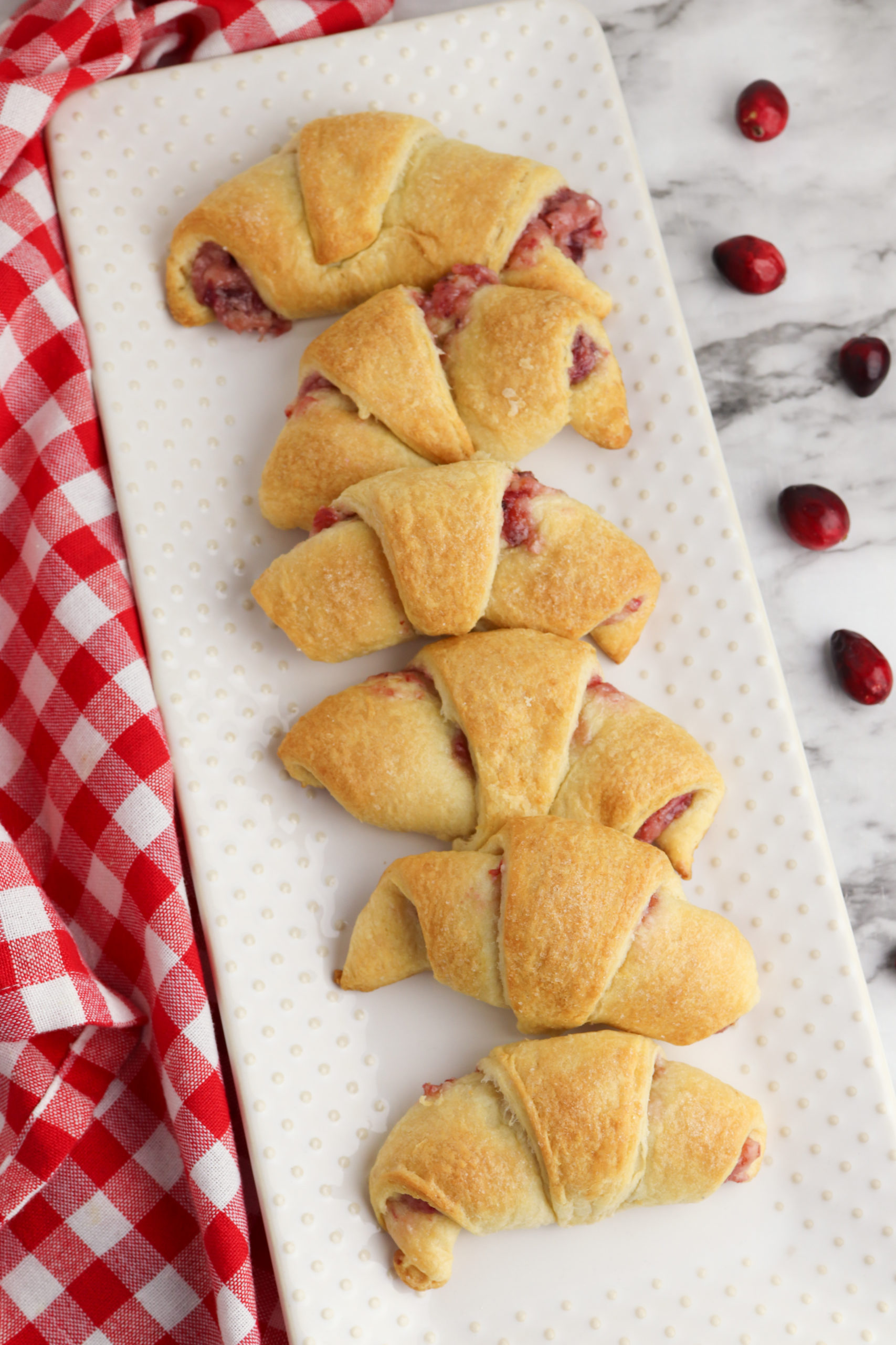 Cranberry Cream Cheese Crescent Rolls on a white plate 