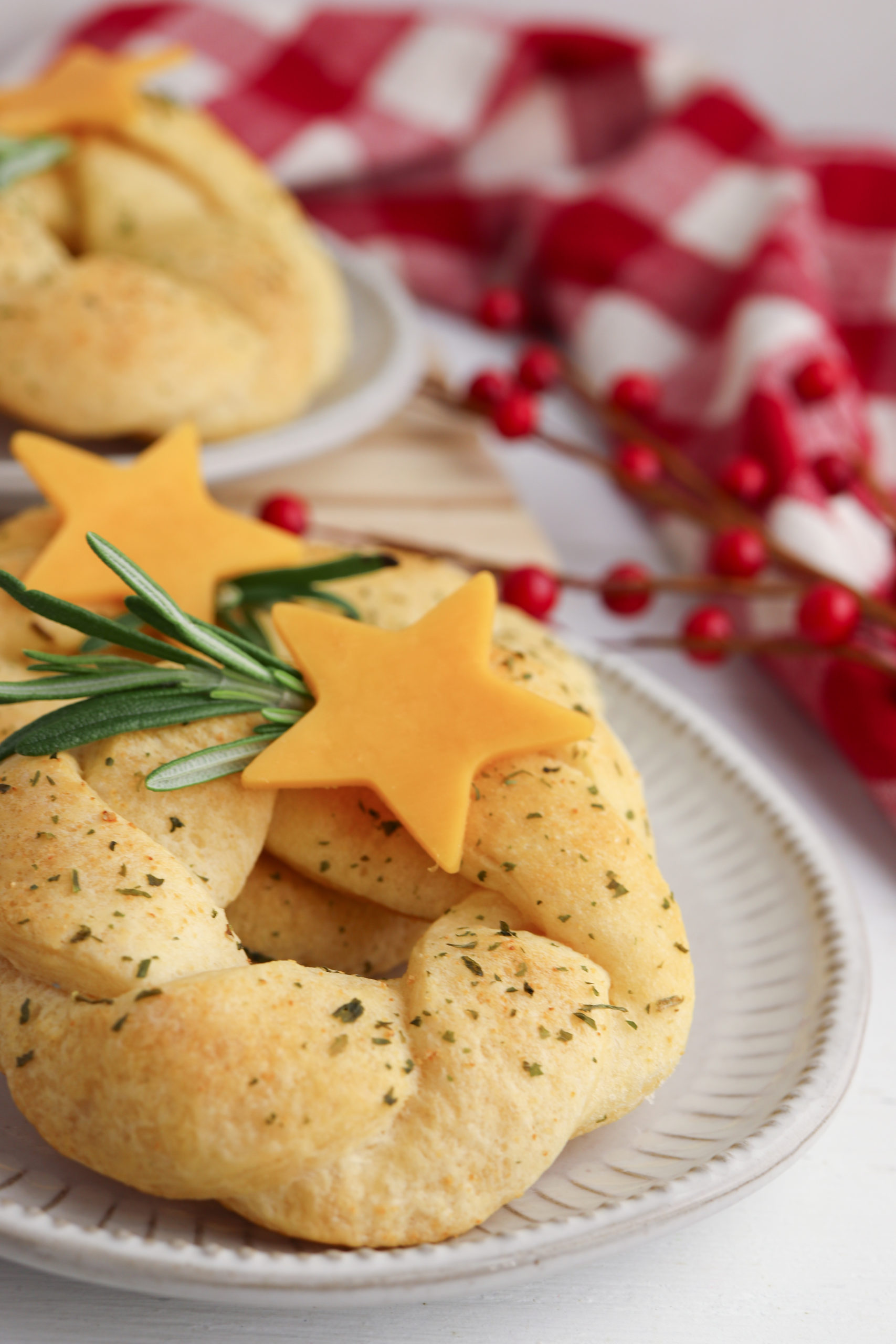Crescent roll wreath with rosemary sprig and cheese star
