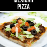 A slice of Mexican pizza on a sheet pan, topped with ground meat, lettuce, tomatoes, and black olives, labeled "sheet pan Mexican pizza recipe."
