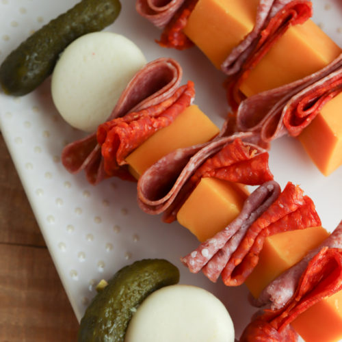 Charcuterie Skewers on a white plate.
