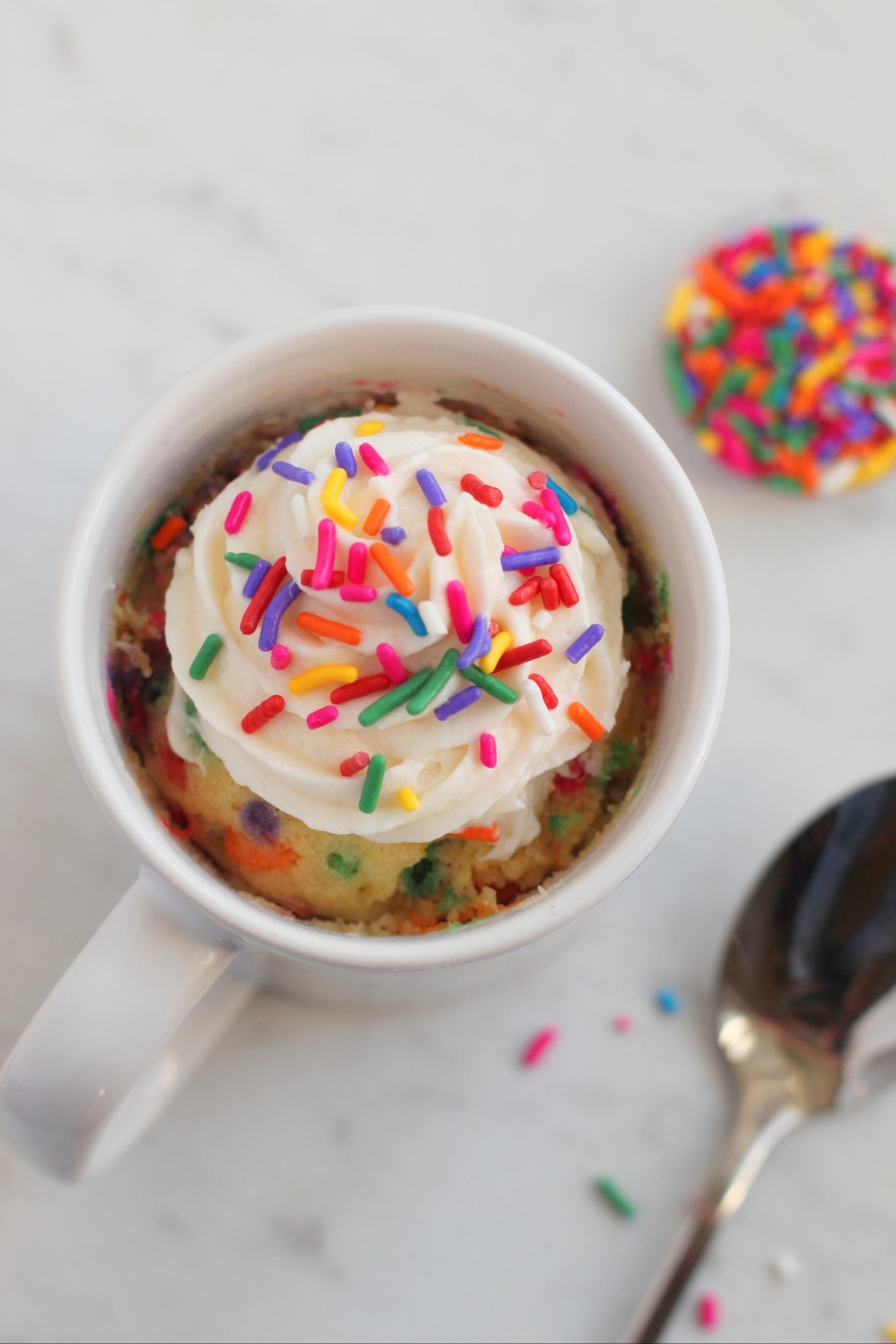 https://www.itisakeeper.com/category/recipes-2/easy-desserts/ with a cup of sprinkles in the background.