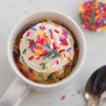https://www.itisakeeper.com/category/recipes-2/easy-desserts/ with a cup of sprinkles in the background.