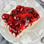 No Bake Cherry Cheesecake on a floral plate.
