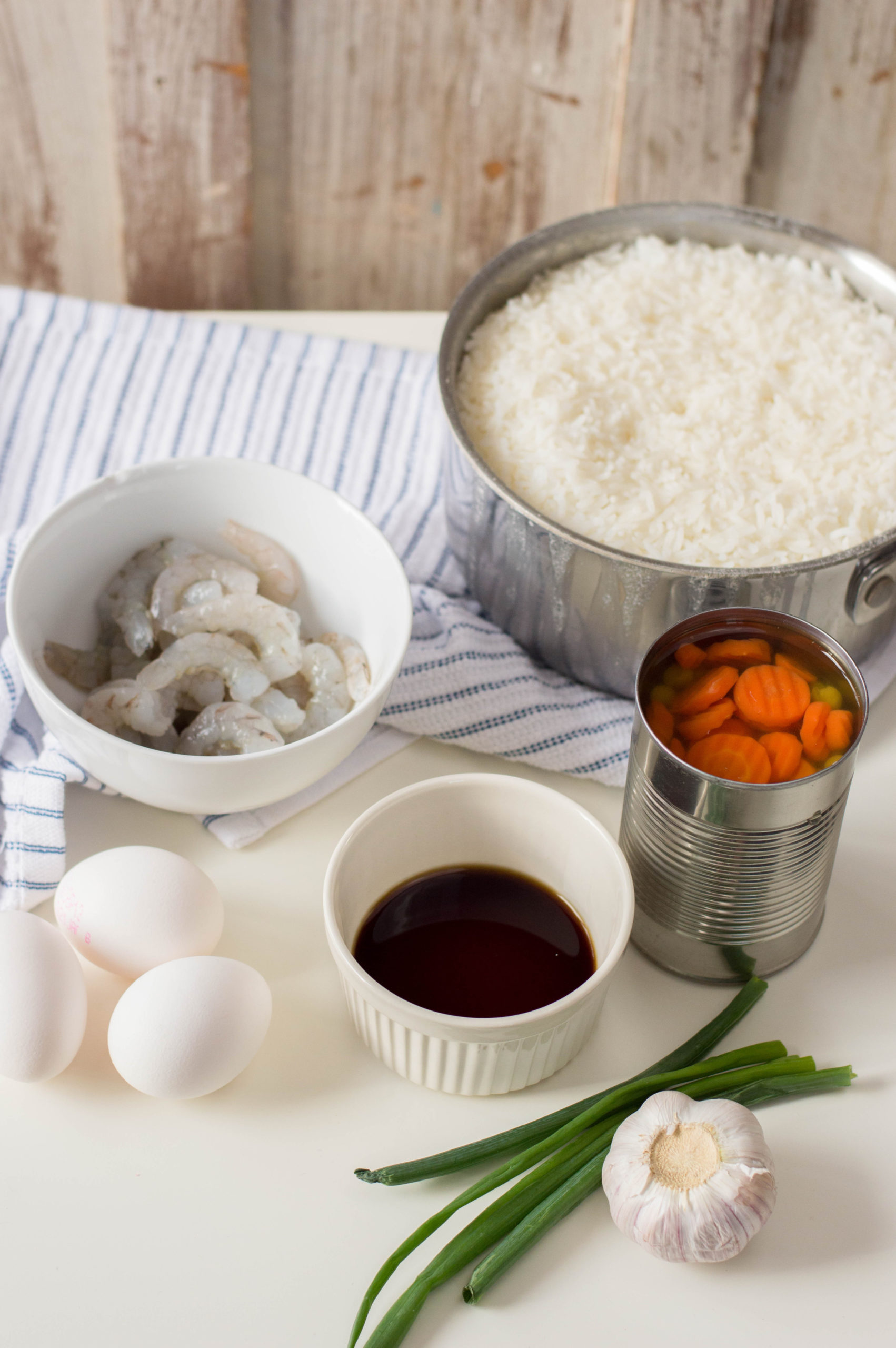 Shrimp, carrots eggs, rice and sauce for Shrimp Fried Rice.