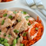 Teriyaki Salmon Bowls with Spicy Mayo in a white bowl.