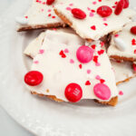 Valentine's day chocolate bark on a white plate.