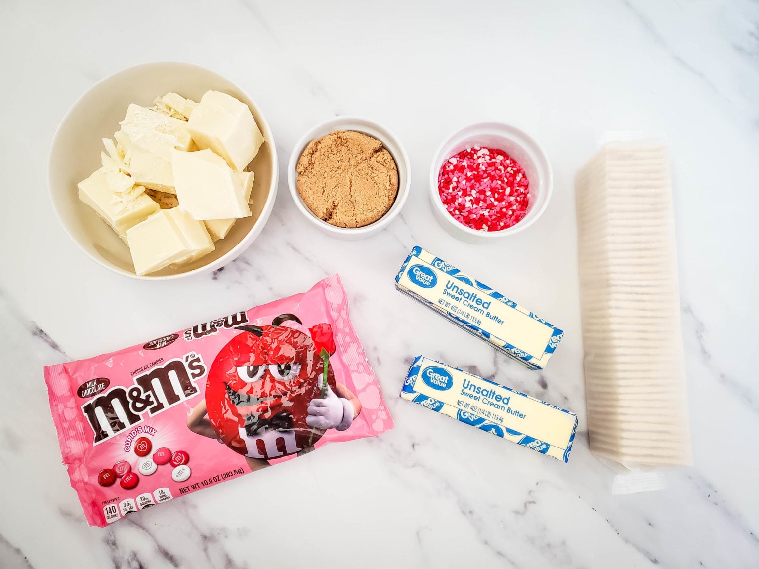 White Chocolate, crackers, M&M's to make the Valentines Cracker Bark.