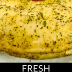 Baked Haddock with Corn Salad seasoned with herbs.