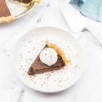 Chocolate Chess Pie on a white plate.
