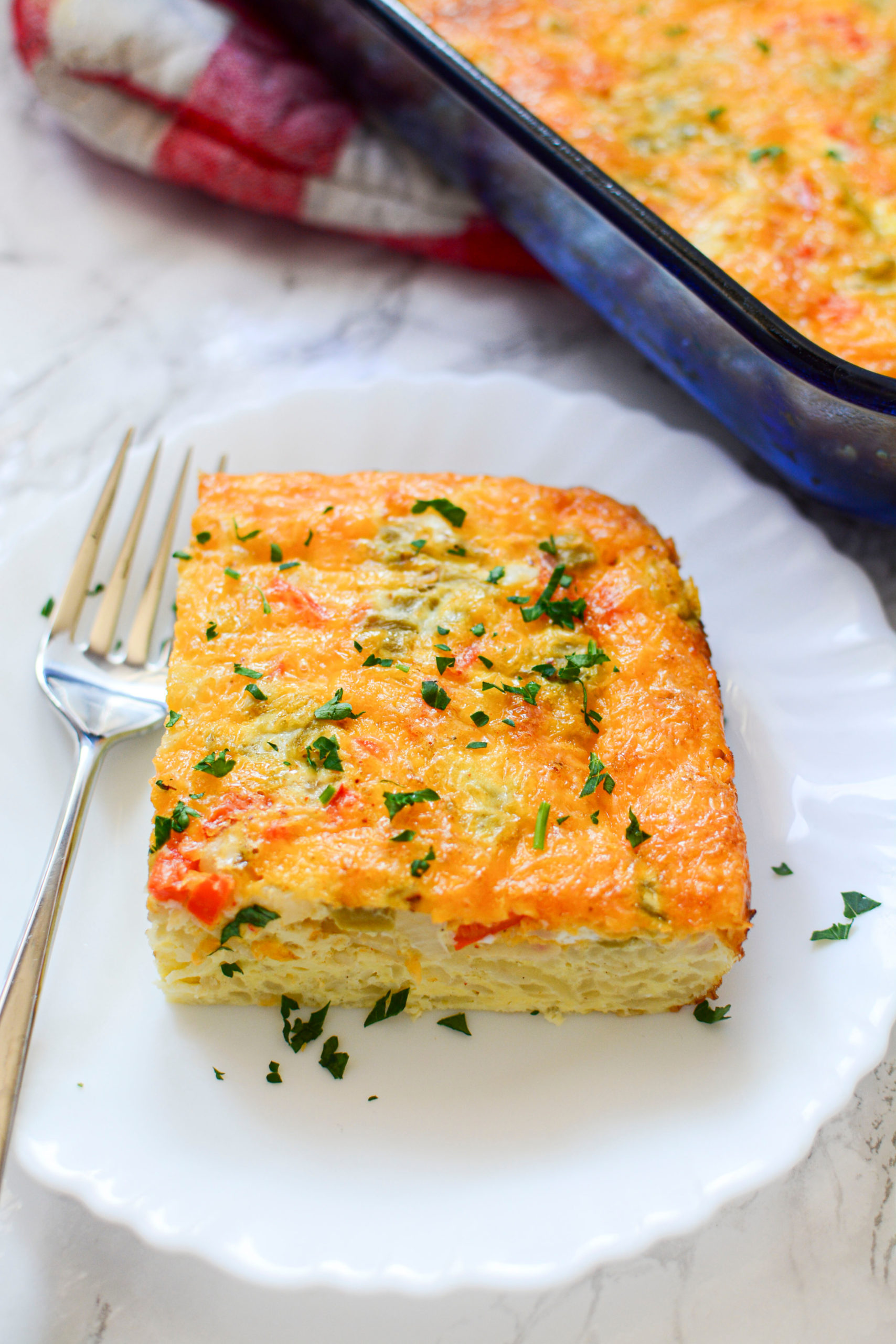 Mexican Breakfast Casserole sprinkled with fresh herbs .