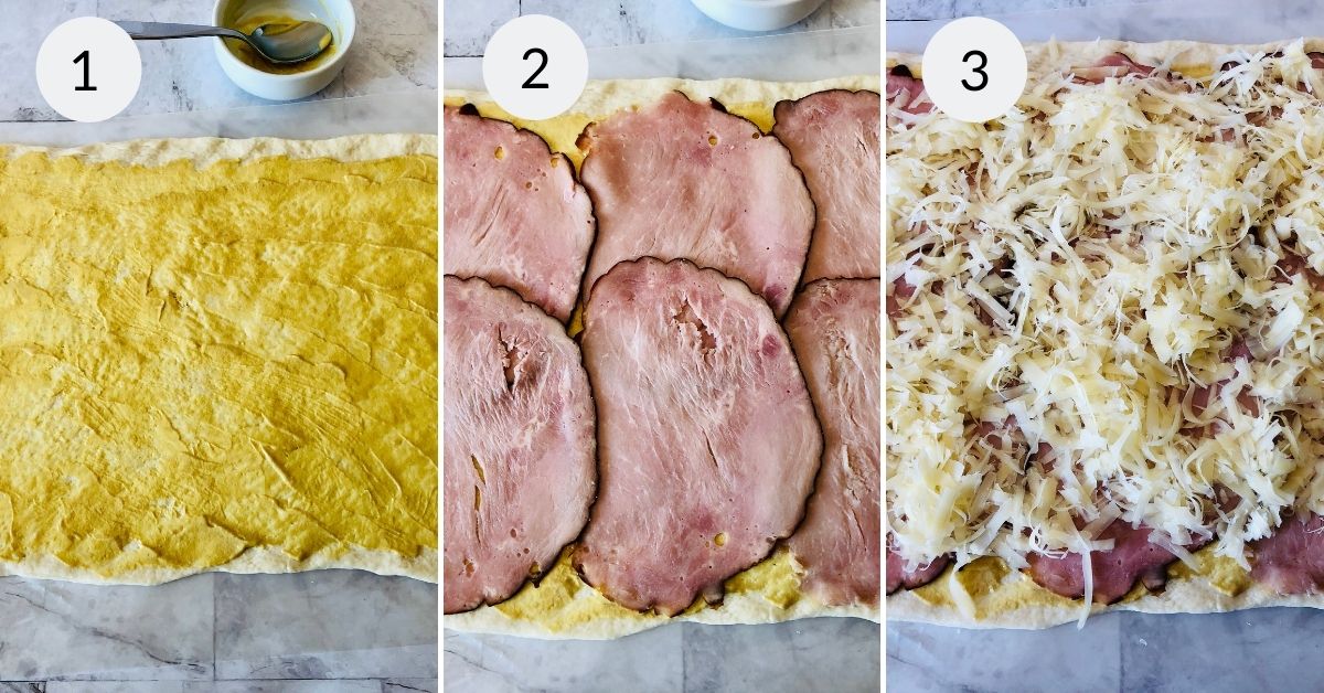Rolled out dough with the ham and cheese on top.