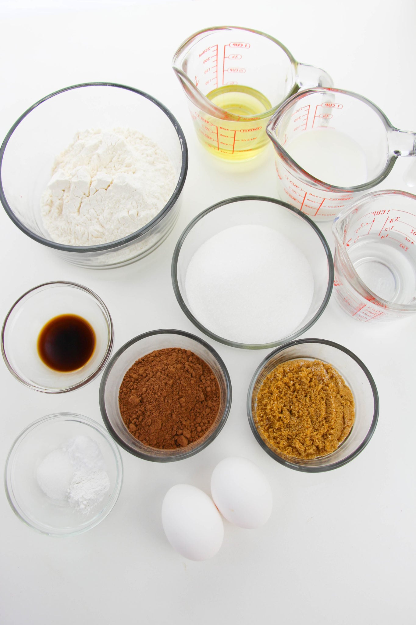 Flour, sugar, butter, vanilla and cocoa to make the cupcakes.