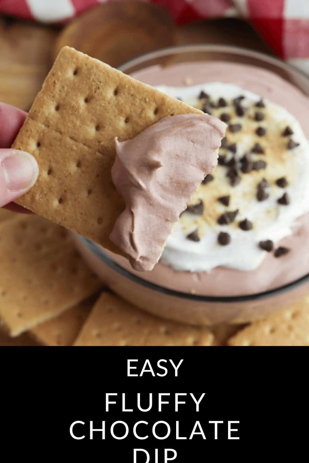 Indulge in a graham cracker covered in our signature Fluffy Chocolate Dip, adorned with whipped cream and sprinkled with rich chocolate chips. Text reads "Easy Fluffy Chocolate Dip.