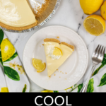 Lemon Icebox Pie served with fresh lemon garnish on a marble countertop.