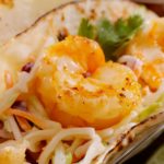 Close up on a shrimp for the Shrimp Mango Salsa Tacos.