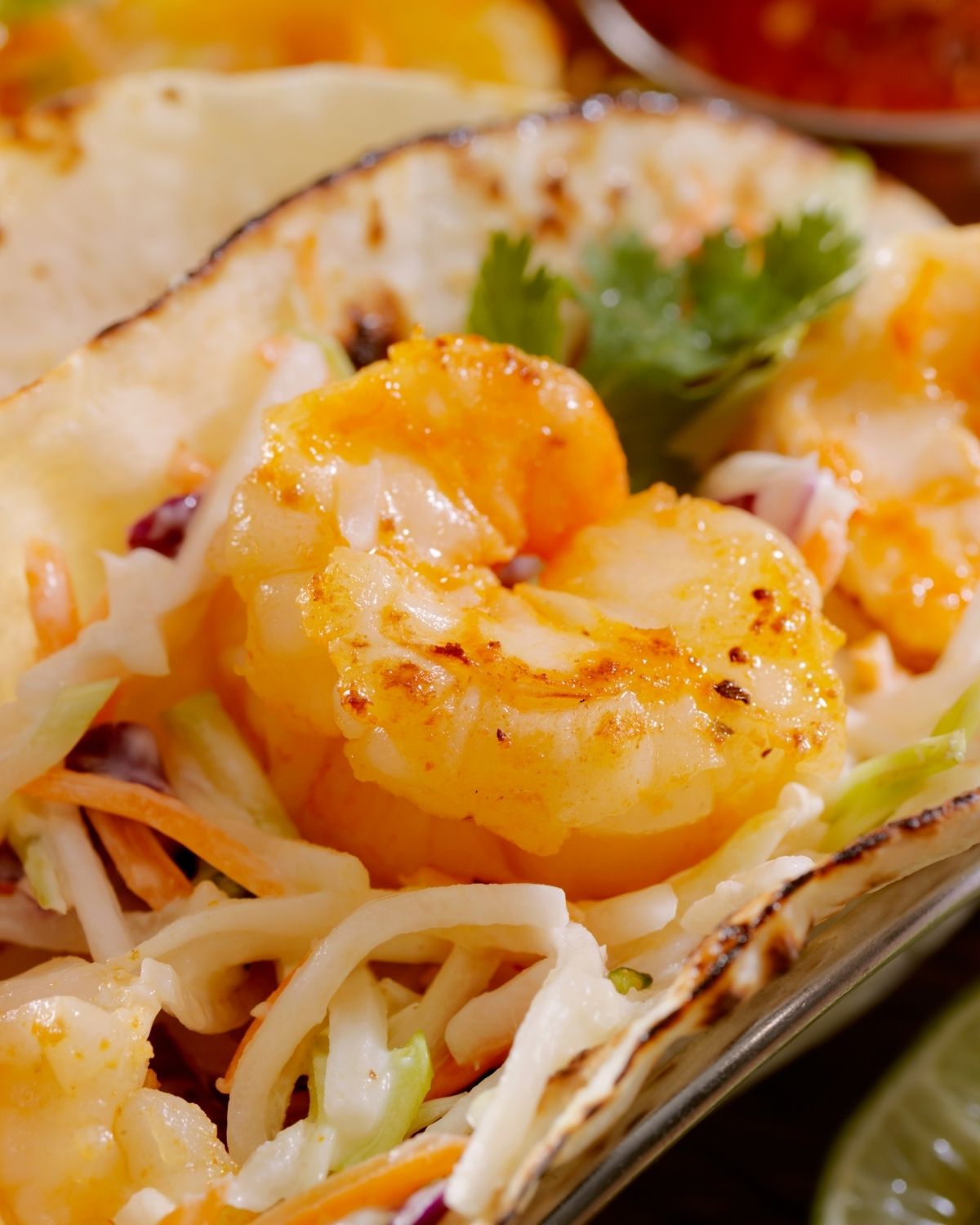 Close up on a shrimp for the Shrimp Mango Salsa Tacos.