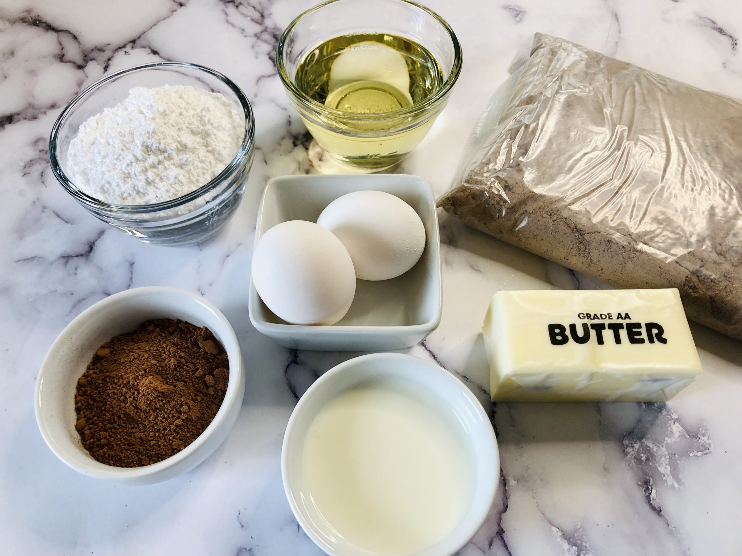 Cake mix, butter, chocolate and eggs to make the cake.