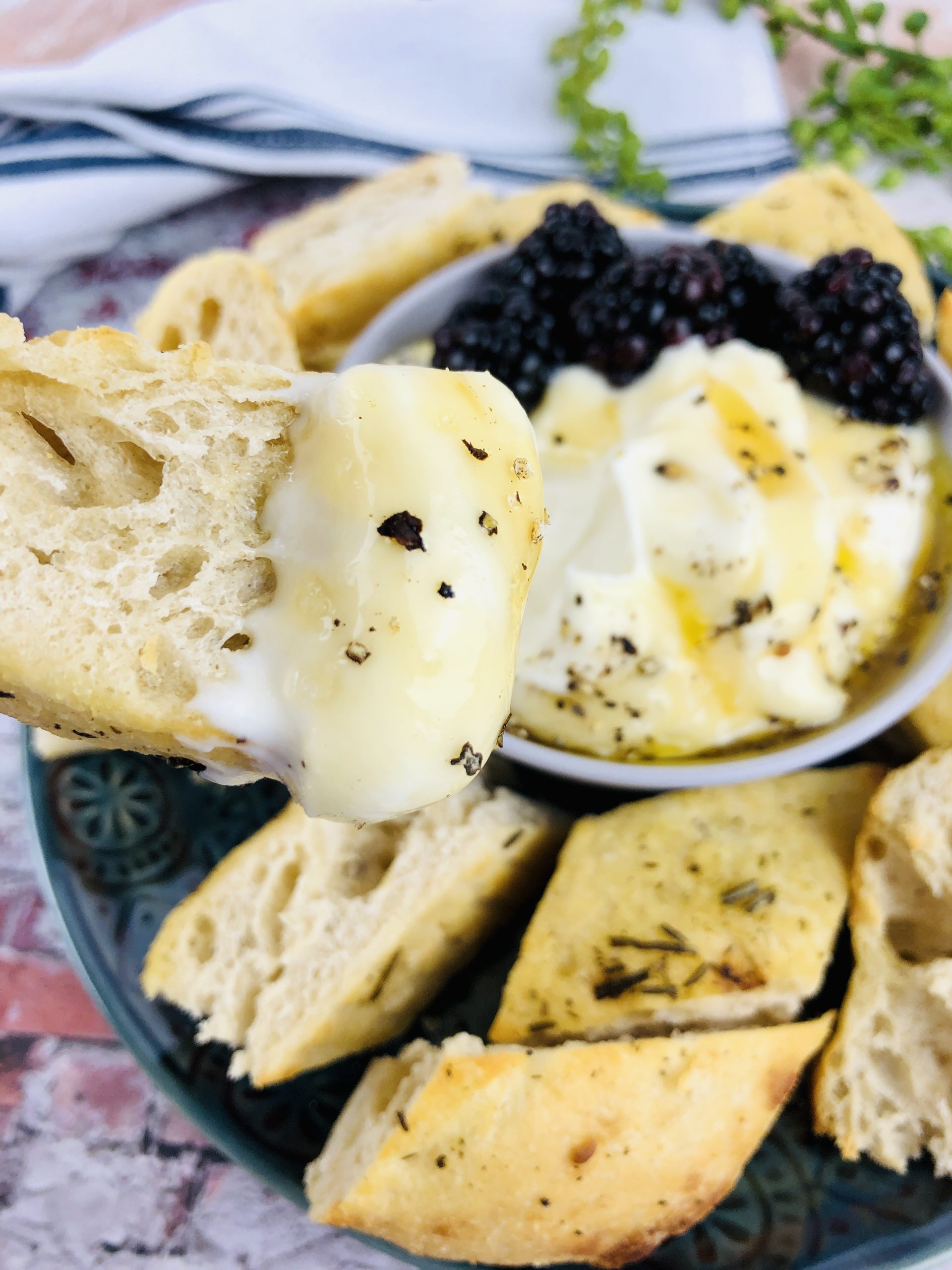 Whipped Ricotta Dip with Honey with a side of black berries and crusty bread.