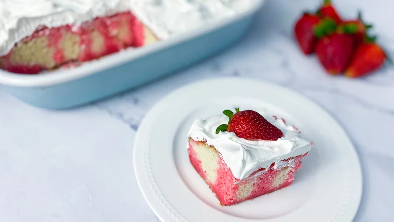 Sweet and pink strawberry poke cake