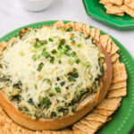 Crackers and baked knorr spinach dip.