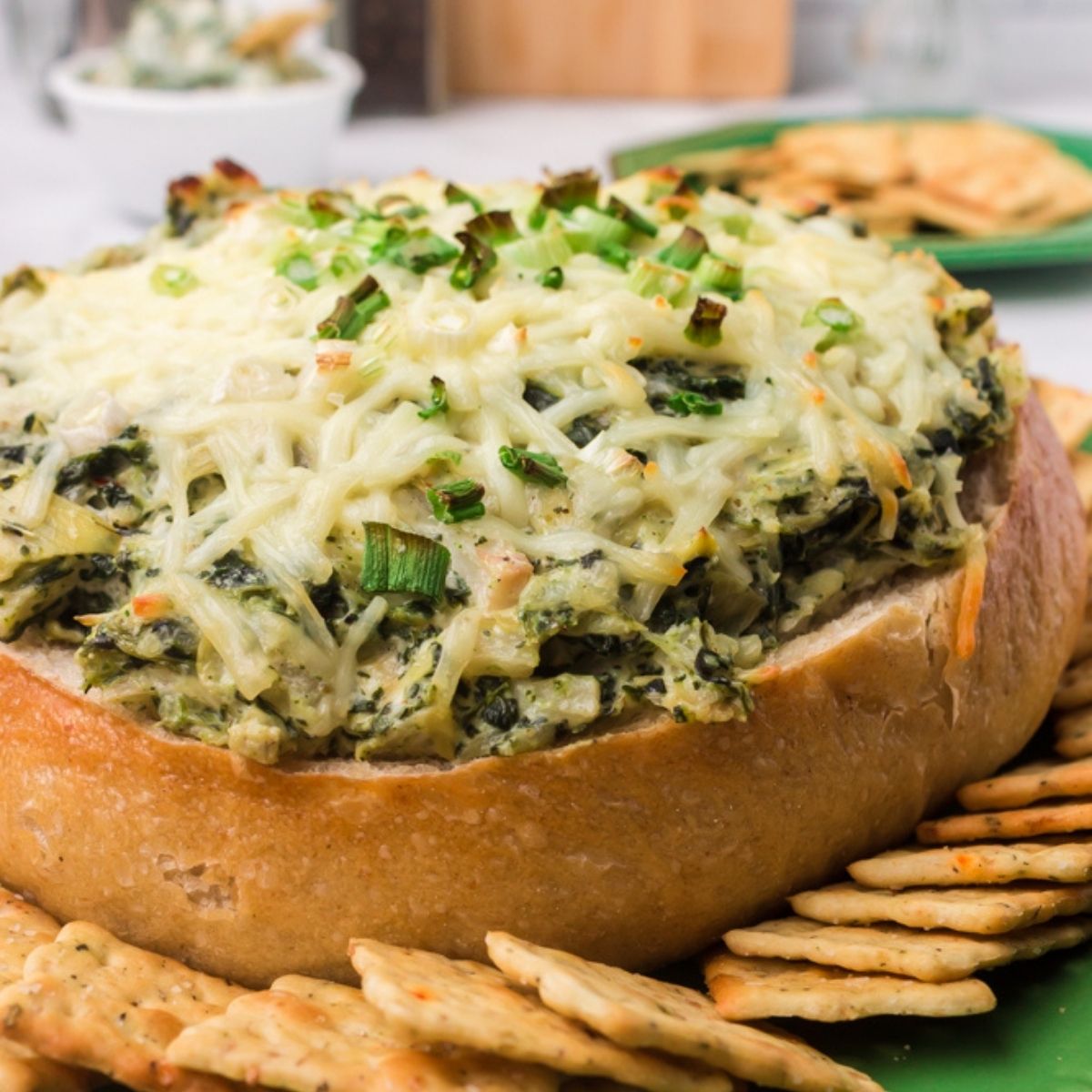 Homemade Baked Knorr Spinach Dip in a bread bowl.