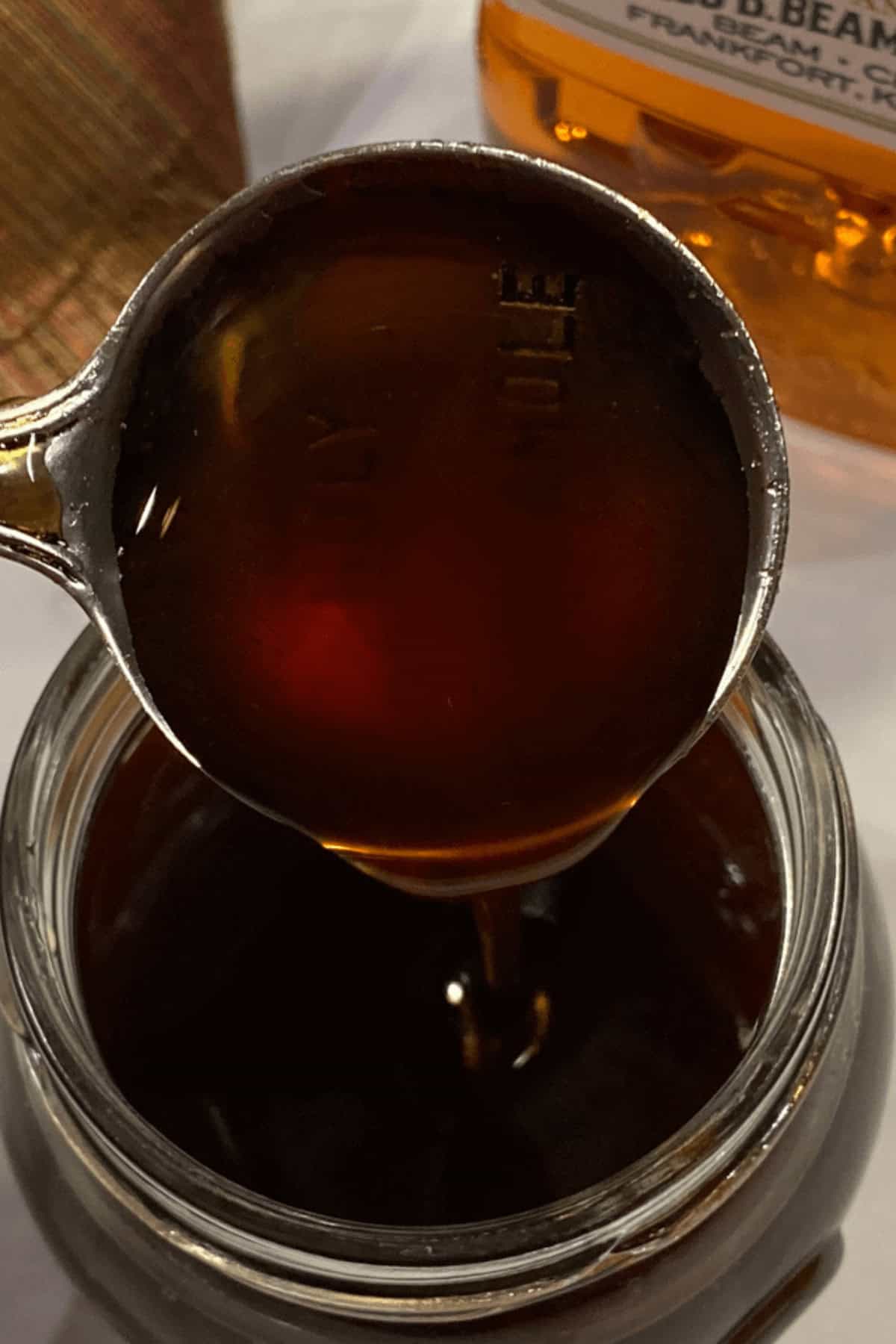 A spoon of the bourbon glaze.