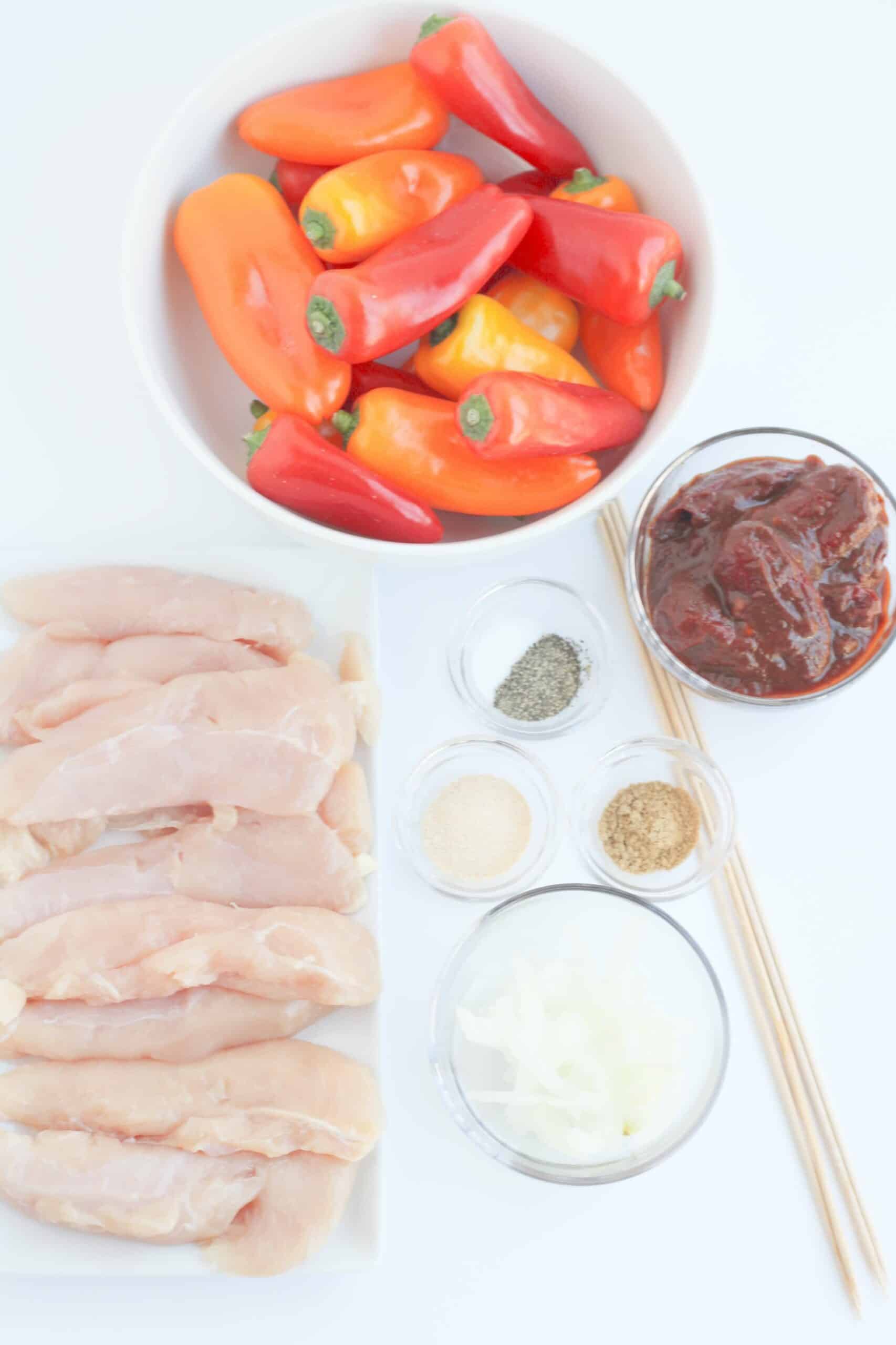 Chunks of meat, vegetables and skewers.