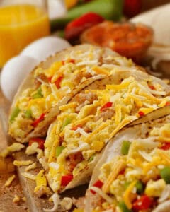 A tray of egg and sausage tacos.