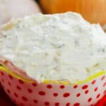 A dish of the garlic and herb cheese spread.