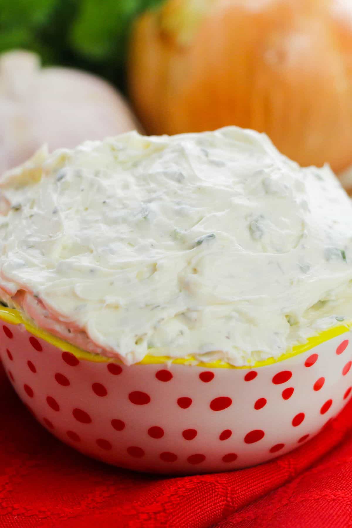 A dish of the garlic and herb cheese spread.