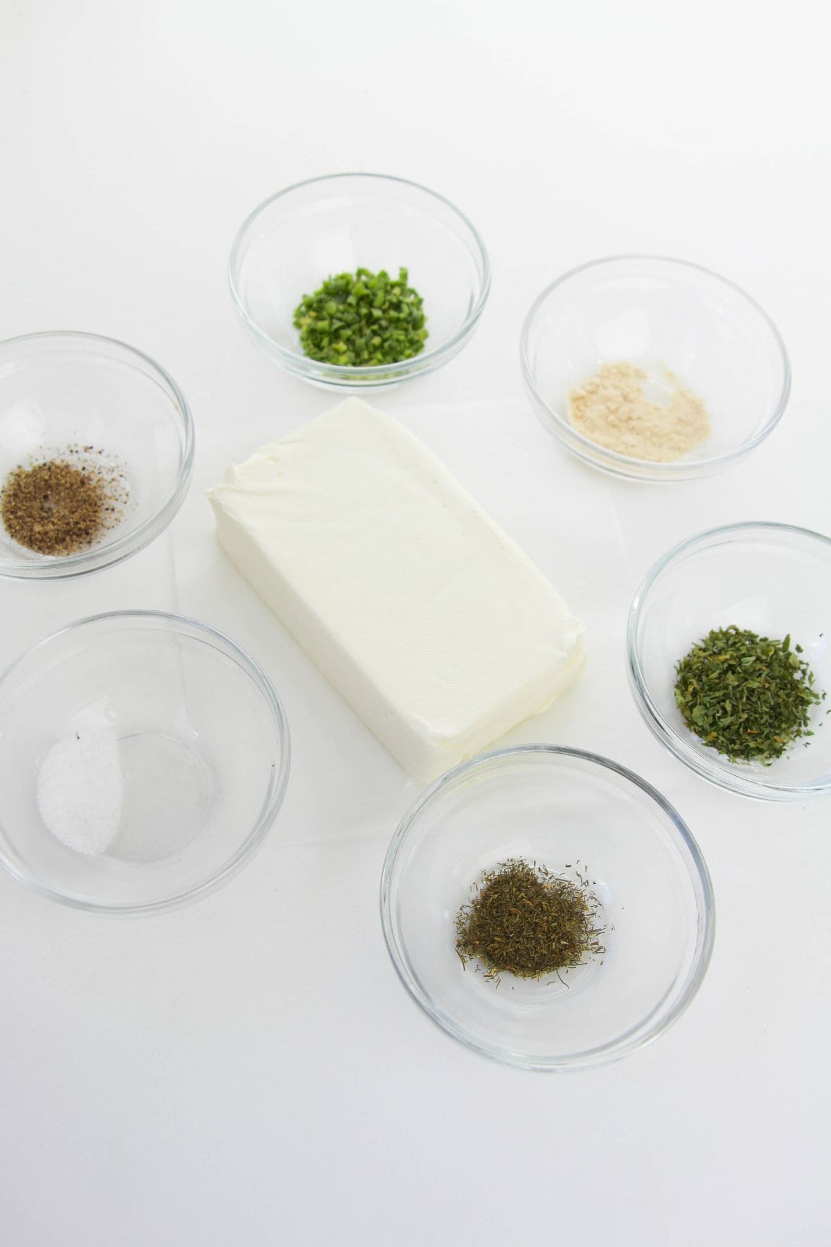 The creamy base with all of the seasonings surrounding it.