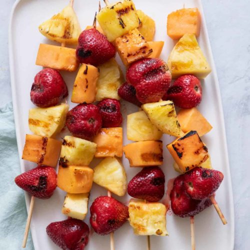 Grilled Fruit Kabobs with strawberries, cantaloupe, pineapples, and bananas