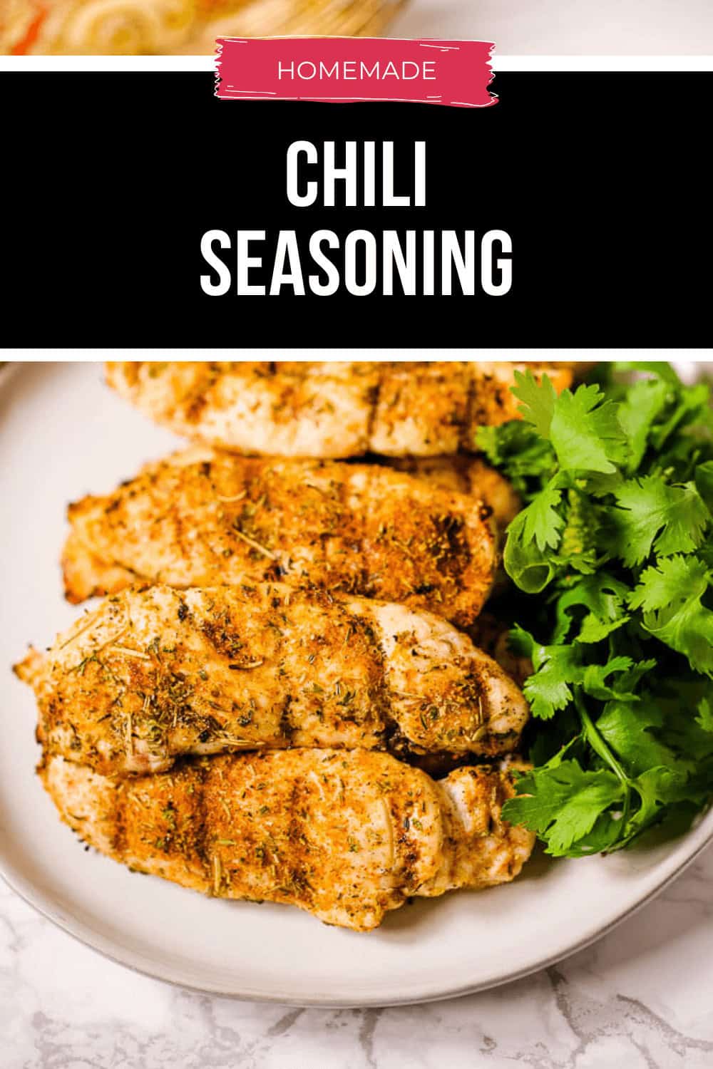 The plate features cooked chicken breasts seasoned to perfection with homemade chili seasoning, garnished with fresh cilantro for a burst of flavor.