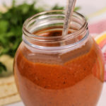 Homemade Substitute for Enchilada Sauce in a glass jar.